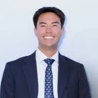 Purnell Strom - smiling man in suit